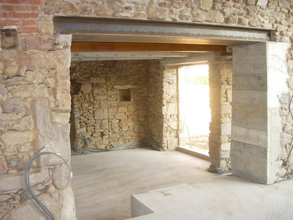 Ouverture de mur en pierre, en béton dans l'Isère
